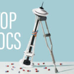 An image of the Space Needle with two bandages on it leaning on a crutch with several capsules underneath it. The text reads: top docs.
